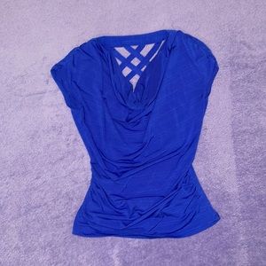 Heartsoul solid royal blue top with diagonal striped pattern on the back